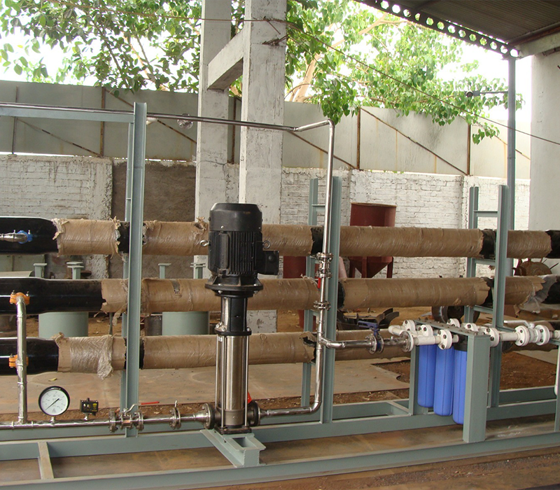 Industrial high-pressure pump and membrane filtration skid by Distingon Engineers & Consultant Pvt. Ltd.