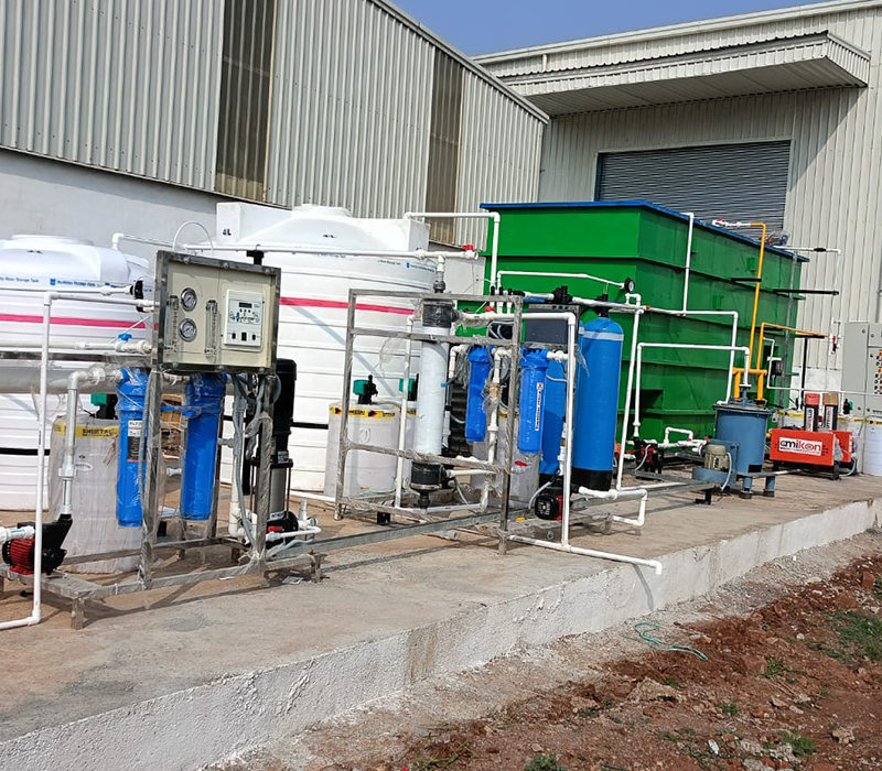 Compact industrial effluent treatment plant with reverse osmosis and filtration units by Distingon Engineers & Consultant Pvt. Ltd.